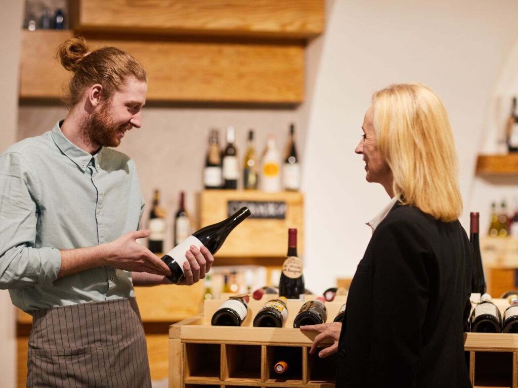 Mulher fazendo compras de vinhos em Buenos Aires