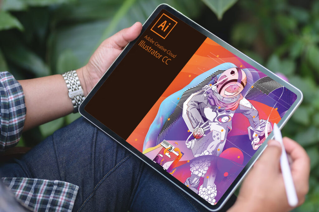 Homem usando Illustrator em um tablet.