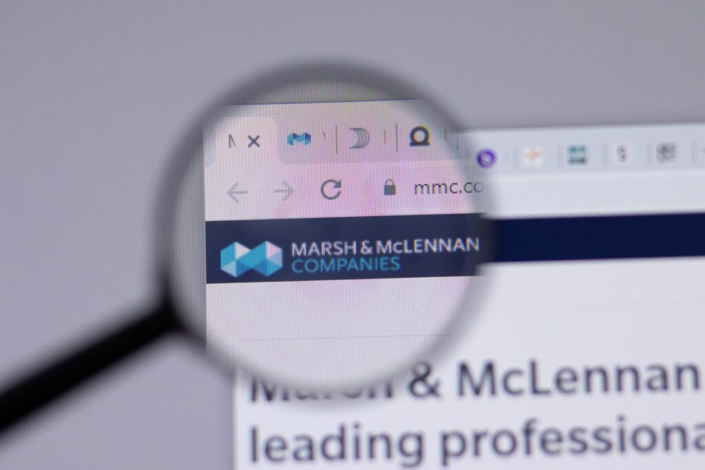 lupa focando no site da Marsh & McLennan Companies, a maior corretora de investimentos do mundo