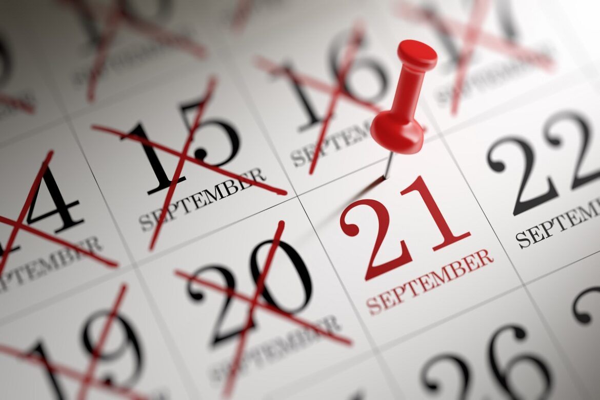 Uma imagem de um calendário com um pino vermelho sobre a quarta-feira, dia 21 de setembro.